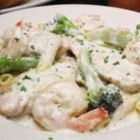 Shrimp Broccoli Alfredo Pasta · Shrimp sauteed with broccoli in our creamy white Alfredo sauce and served over choice of pas...
