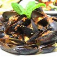 Mussels Marinara Pasta · P.E.I. mussels sauteed with a touch of garlic in our house marinara sauce served over lingui...