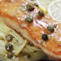 Salmon Picatta Pasta · Pan seared salmon in a lemon wine sauce with capers, served with choice of pasta. Served wit...