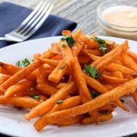 Cajun Sweet Potatoes Fries · A blend of golden sweet potato fries tossed in Cajun seasoning and fresh ground parsley serv...