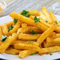 Cajun French Fries · A blend of golden potato fries tossed in Cajun seasoning and fresh ground parsley served wit...