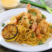 Cajun Fried Shrimp with our House Special · Fried shrimp covered in a creole cream sauce over garlic butter noodles.