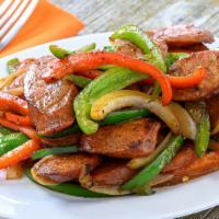 Louisiana Hot Links · Hot Louisiana style hot links sauteed with onions, green and red bell peppers in a fire wok ...