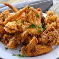 Bayou Cajun Fried Chicken Wings · Six of our Cajun spiced famous chicken wings.