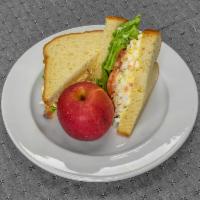 Egg salad · House made egg salad, mayo, lettuce, tomatoes, and red onion on brioche bread. Comes with 1 ...
