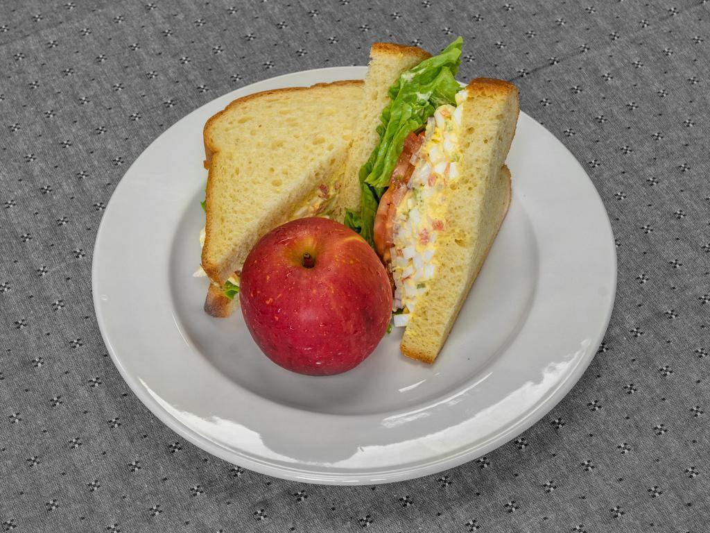 Egg salad · House made egg salad, mayo, lettuce, tomatoes, and red onion on brioche bread. Comes with 1 side.
