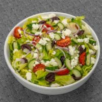 Greek Salad · Romaine lettuce, feta cheese, Kalamata olives, roasted tomatoes, cucumbers, and red onion. C...