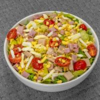Chef Salad · Romaine lettuce, spiraled ham, turkey, provolone cheese, tomatoes, hard boiled egg, and your...