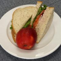 Tuna Salad Sandwich Box · House made tuna salad, lettuce, tomatoes, and red onion on whole grain bread. Mayo and musta...