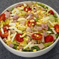 Chef Salad Box · Romaine lettuce, spiraled ham, turkey, provolone cheese, tomatoes, hard boiled egg, and your...