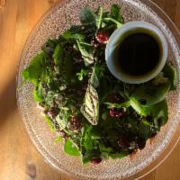 The Olive Oil Salad · Baby spinach, dried cranberries, Gorgonzola, toasted sesame seeds, poppy seeds, balsamic dri...