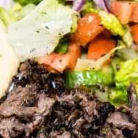 Obay's Beef Shawarma plates with 2 Sides · Marinated beef shawarma served with pita bread, tahini sauce, and 2 choices of salad, french...