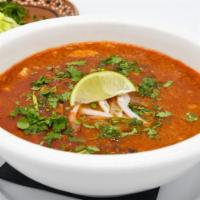 Sopa Azteca (Chicken Tortilla Soup) · Avocado, chicken, fresh cheese, and scallions.