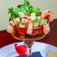 Shrimp Cocktail · Mexican Shrimp cocktail with our special sauce, tomatoes, cucumber, onion, radish, cilantro ...