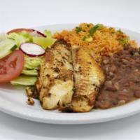 Filete de pescado · Pan-fried fish served with frijoles, Mexican rice and salad