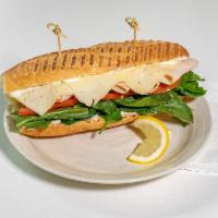 Hot Turkey Havarti Sando · Spinach, lemon dill mayo, with lettuce and tomato French roll.