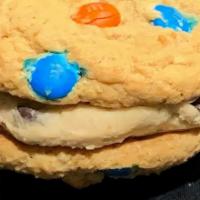 Cookie Dough Sandwich · A cookie dough sandwich, choose your cookie flavor and we fill them with chocolate chip cook...