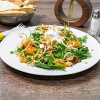 Noosh Salad · Baby spinach, arugula, mandarin orange, walnuts, date, and feta cheese.