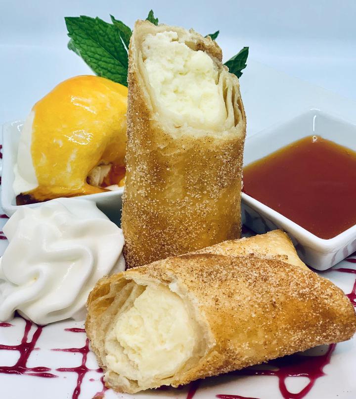 Fried Cheese Cake · Rich, smooth cheesecake, with a slight tangy finish, rolled in a melt-in-your-mouth, flaky pastry tortilla.