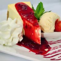 New York Cheese Cake · Cheesecake so creamy, so smooth, so satisfying, topped with strawberry sauce.