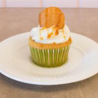 Banana Pudding · Banana cupcake filled with Bavarian cream, cream cheese frosting topped with a vanilla wafer...