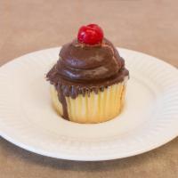 Boston Cream · Yellow cupcake with Bavarian cream filling iced with a chocolate whipped dipped in chocolate...