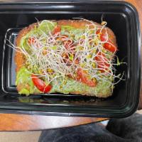 Avocado Toast Breakfast · Avocado, sprouts, cherry tomatoes on Dave's killer bread.