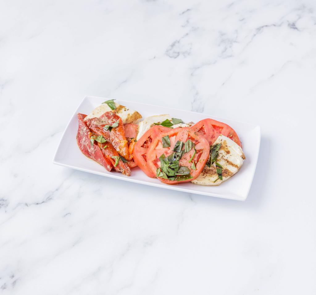 Caprese · Fresh mozzarella, sliced tomatoes and roasted Holland peppers.