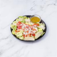 Insalata Liana's · Boston lettuce, roasted peppers and pears with crumbled Gorgonzola cheese.