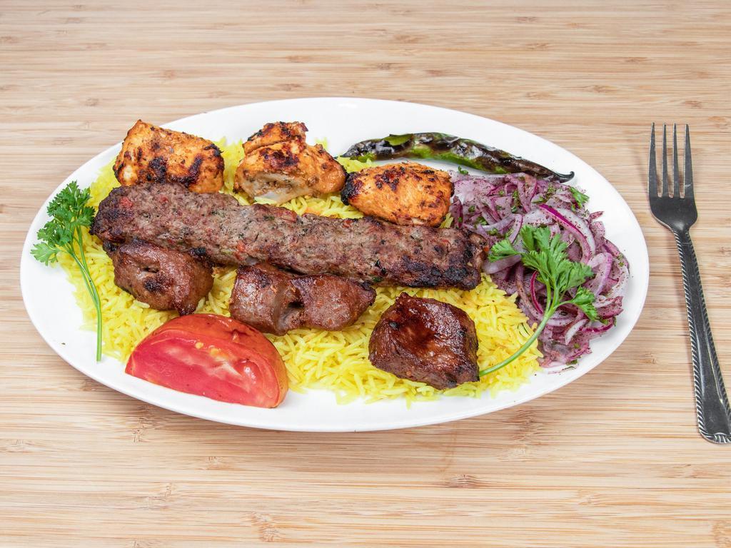 Combo Chicken Kofta and Shish Kabab · Marinated chicken ground and cube grilled. Served with rice, hummus, greek salad, and pita bread.