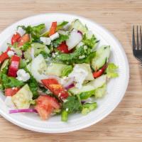 Greek Salad · Green lettuce, cucumber, tomato, onion, olive, and fetta cheese.