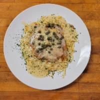 Chicken Francese · Floured, egg washed and sauteed in a white wine lemon butter sauce.