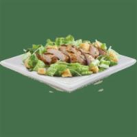 Chicken Caesar Salad · Caesar salad topped with grilled chicken breast.