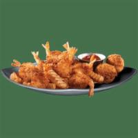 Shrimp and Chips Basket · A generous portion of breaded shrimp. Served with cocktail sauce, two hush puppies, and Nath...