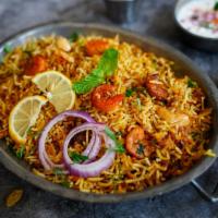 Shrimp Biryani · Layers of fluffy saffron flavored basmati rice cooked with marinated shrimp in aromatic spic...