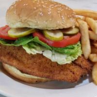 Fried Fish Sandwich · More than half a pound of grouper filet battered ＆ fried served on a bun with lettuce, tomat...