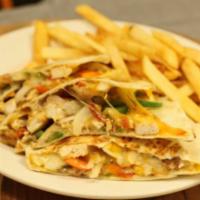 Chicken Quesadilla · Grilled Chicken Breast with peppers, onions, and cheddar cheese served with sour cream

