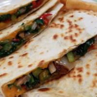 Veggie Quesadilla · Grilled peppers, onions, spinach, mushrooms ＆ cheddar cheese served in a grilled tortilla wi...