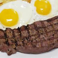 Steak ＆ Eggs · 8 oz New York strip served with 2 eggs any style and hashbrowns.