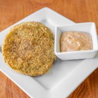 Fried Green Tomatoes  · (4) – Four golden brown buttermilk battered fried green tomatoes.