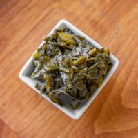Collard Green · Slowly simmered, savory Southern style.