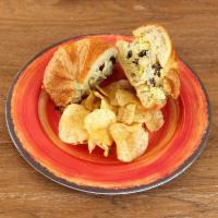 Chicken Salad Sandwich · Curried chicken salad with dried cranberries on a butter croissant.
