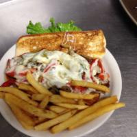 Philly Beef Specialty Sandwich · Thin slices of beef topped with mozzarella cheese, green peppers, onions and mushrooms. Serv...
