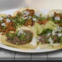 Tacos · Tacos with Grilled corn tortilla, onion, cilantro and the house sauces. You can choose the m...