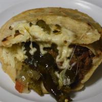 Rajas Con Queso (Green Chili Slides) · Handmade gordita of corn or flour. With green chili, mozzarella chesse and refried beans.
Go...