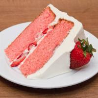 Strawberry Cake · Fresh strawberries are mixed into the batter of our famous yellow cake and placed between th...