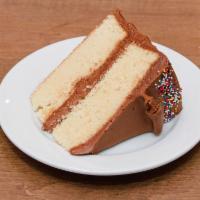 Yellow Vanilla Cake with Vanilla Frosting · The classic vanilla cake with vanilla buttercream frosting
