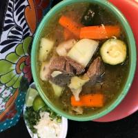 Beef Soup / Caldo De Res · Served with carrots, potatoes, squash, cabbage, chayote & a side of rice, onion, cilantro, c...