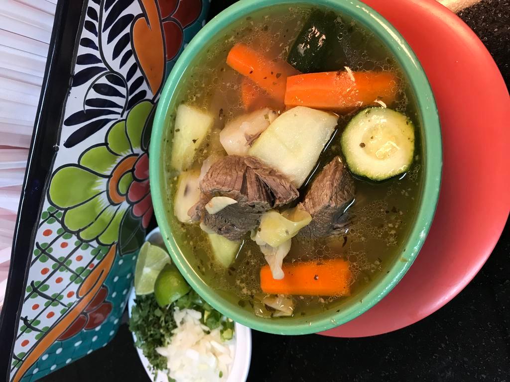 Beef Soup / Caldo De Res · Served with carrots, potatoes, squash, cabbage, chayote & a side of rice, onion, cilantro, chile and lime. choice of tortilla.