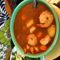 #55. Shrimp Soup / Caldo Camaron · Shrimp soup served with carrots, potatoes, chayote. With a side of onion, cilantro, chile an...